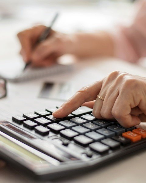 Image of business handshake or financial charts